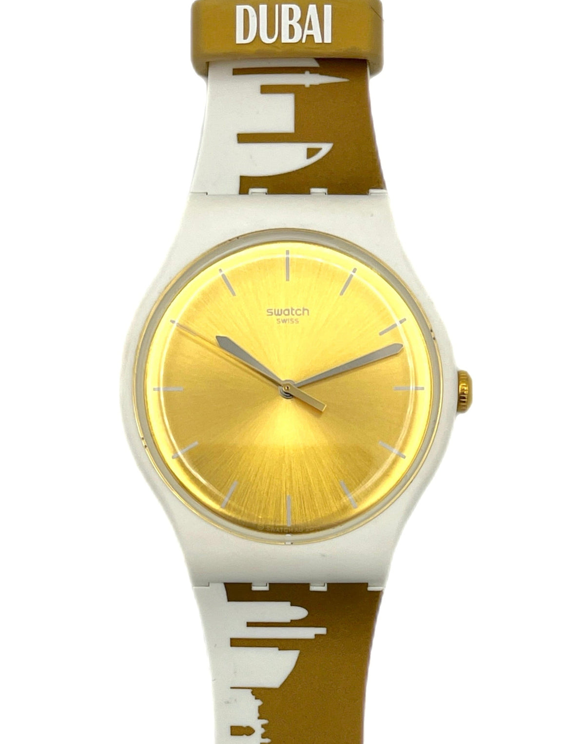 Watch with gold face and white and brown strap on a white background