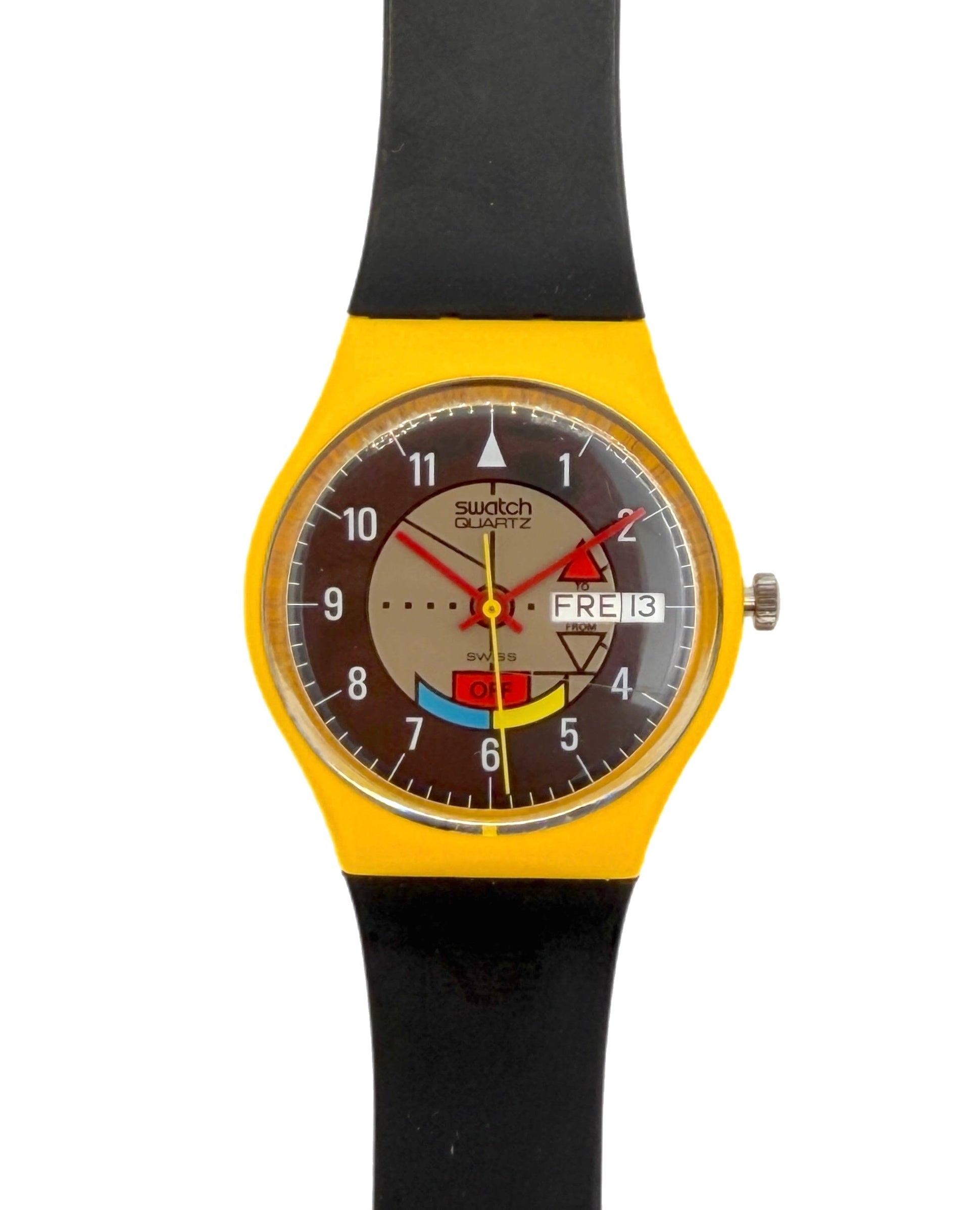 Swatch wristwatch with a bright yellow case, black strap, and a brown dial featuring colorful Swatch logo graphics and a day/date window.