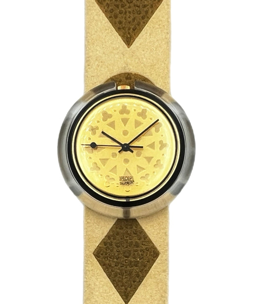 Wristwatch with gold face and patterned strap on a white background