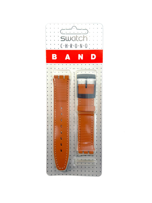 Swatch Chrono watch band in orange, shown in its original retail blister packaging against a white background.