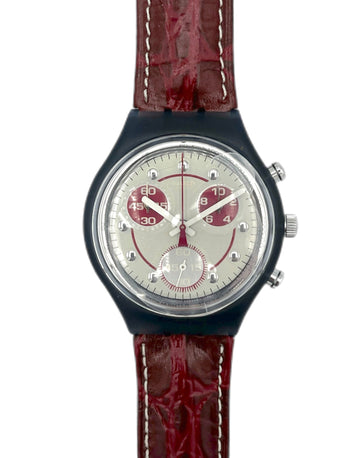Watch with a red strap on a white background