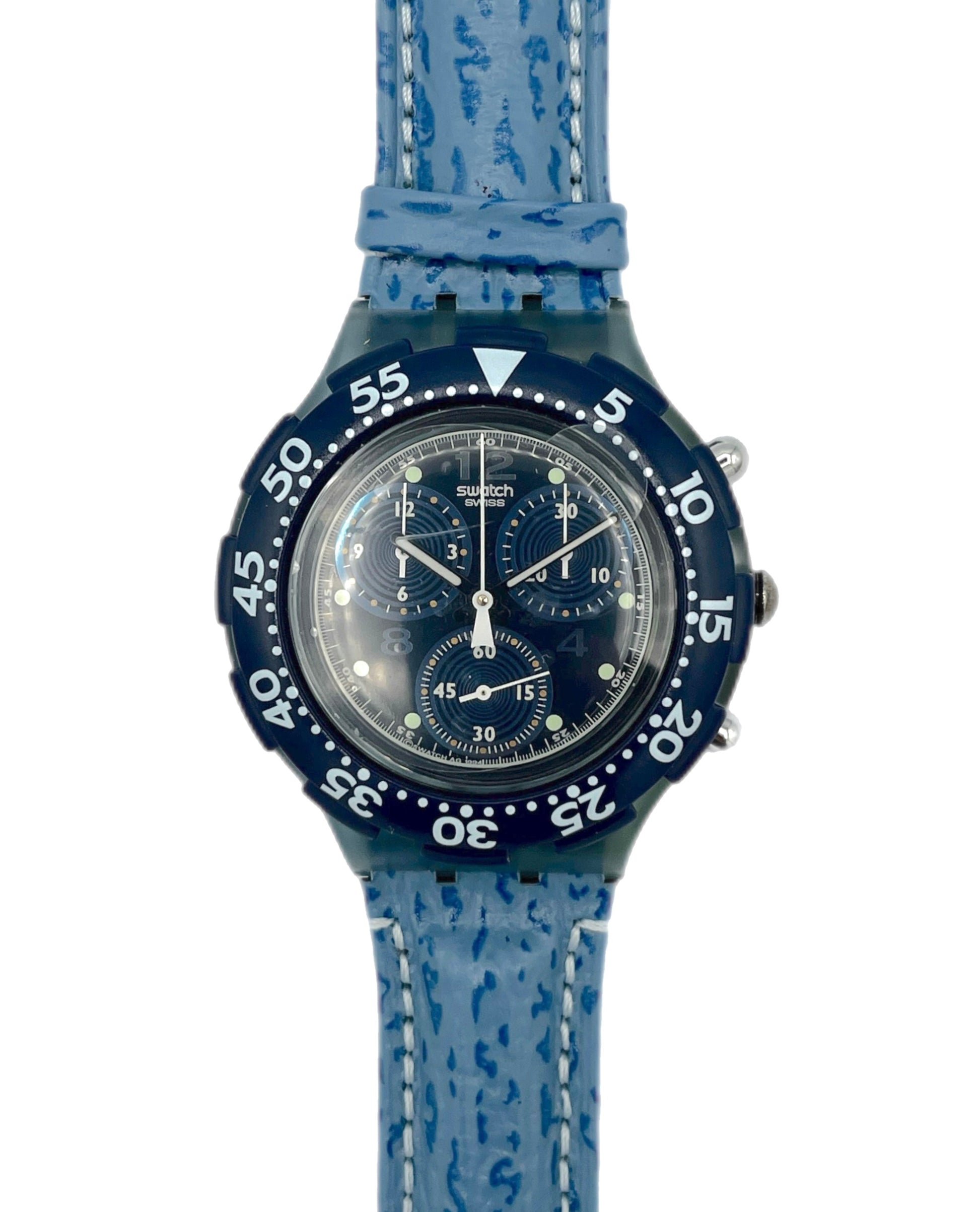 Blue watch with a textured strap on a white background