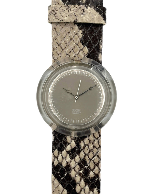 Wristwatch with a patterned strap on a white background