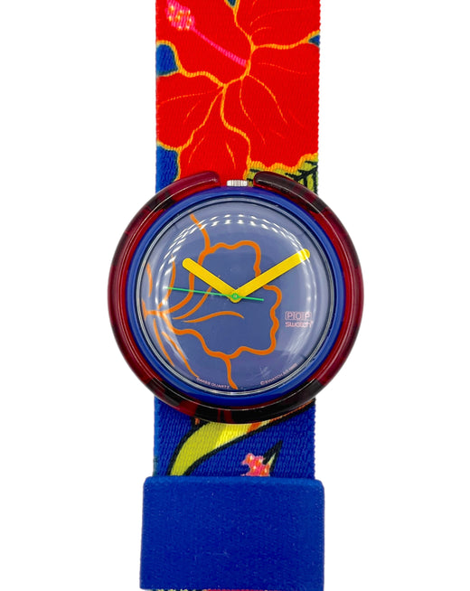 Watch with a colorful strap featuring floral designs on a white background