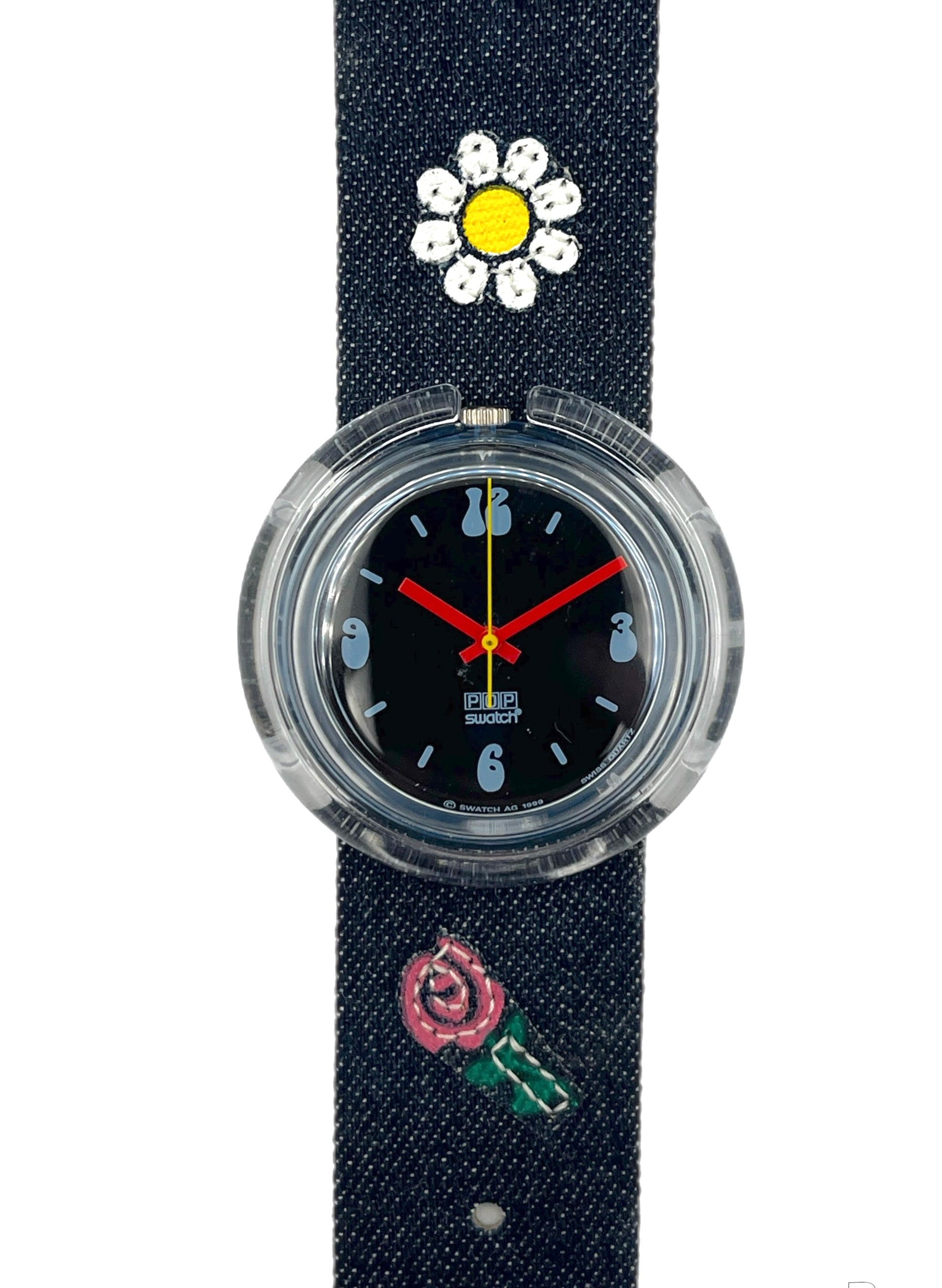 Wristwatch with floral designs on a dark blue strap against a white background