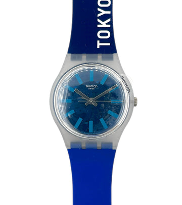 Blue Swatch watch with 'Tokyo 21' text on a white background