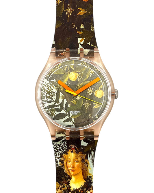 Watch with a unique strap design featuring a portrait and nature elements on a white background