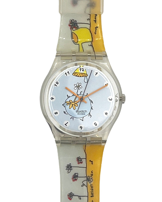 Swatch wristwatch with a clear plastic case and strap, featuring a white dial with black numerals and orange hands, decorated with a yellow flower and illustrated with 'my day' and 'can you believe it' text on a white background.