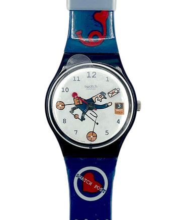 Swatch watch with blue strap and white face on a white background