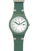 A Swatch wristwatch featuring a sage green silicone strap and matching green case with a white dial, shown against a plain white background.