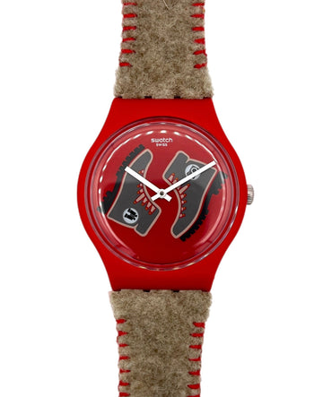 Red watch with a textured brown strap on a white background