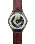 Watch with a brown leather strap on a white background