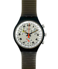 Swatch watch with a green strap on a white background