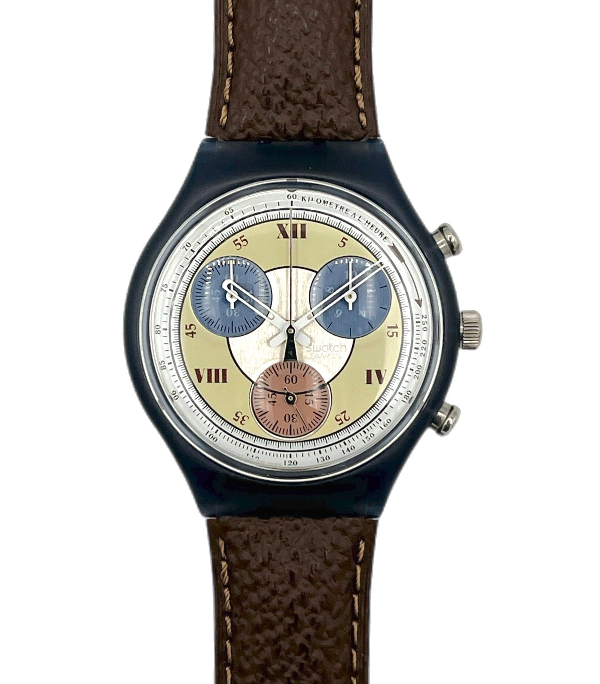 Watch with a brown leather strap and multicolored face on a white background