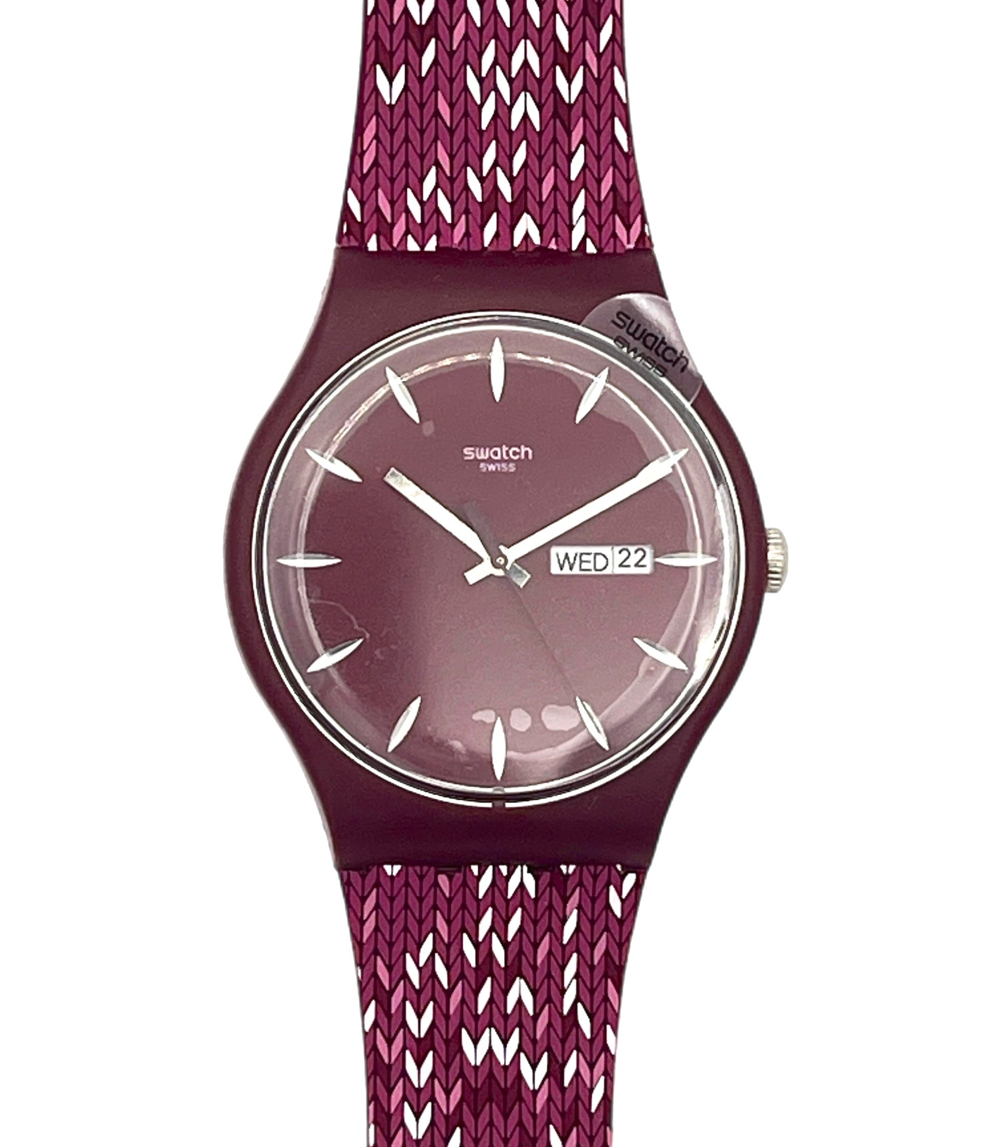 Swatch wristwatch with a burgundy round case, a matching burgundy dial with silver-tone hands and markers, and a textured knit strap in burgundy and white.
