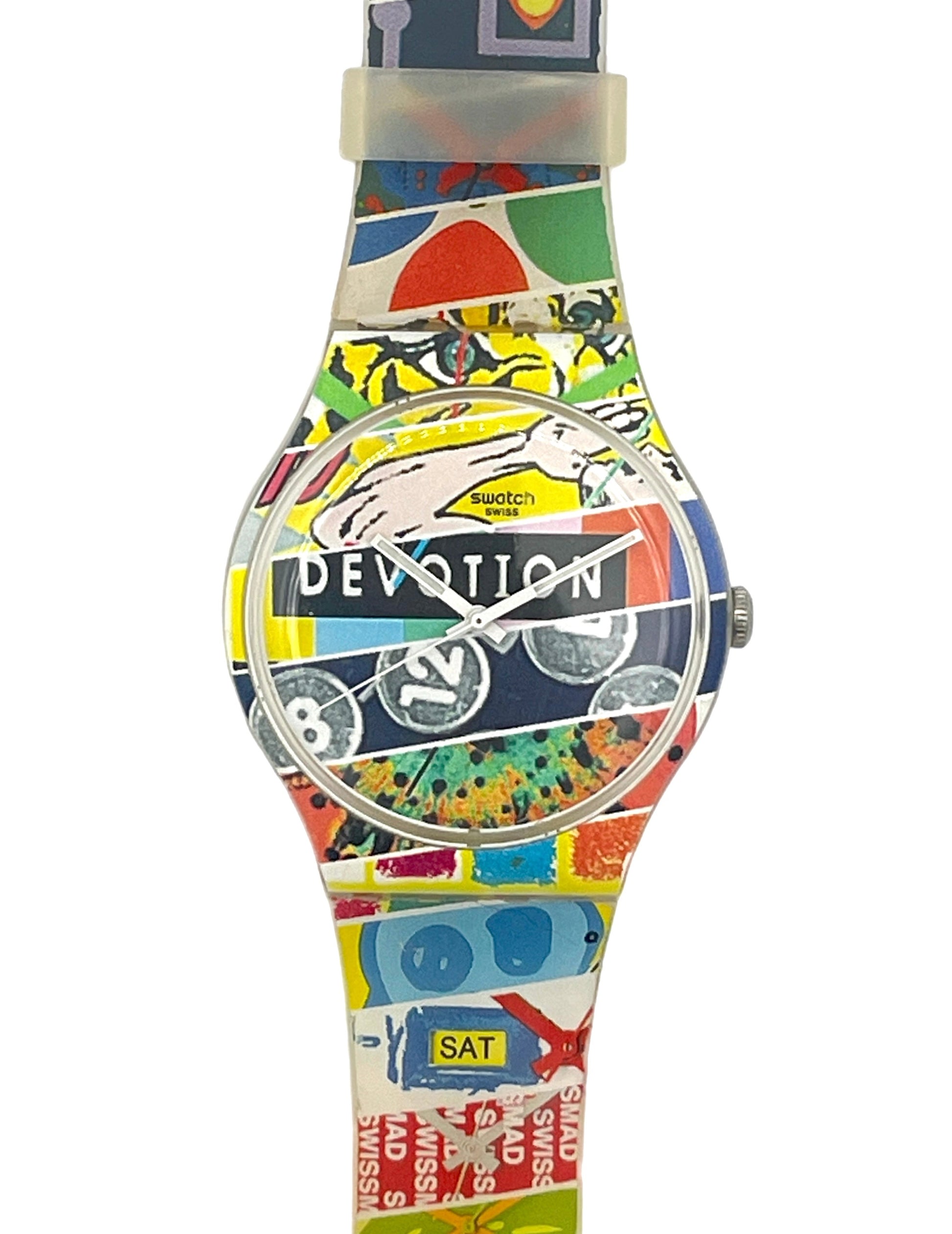 A Devotion brand wristwatch with a colorful, collage-style printed strap and dial featuring various cartoon, text, and graphic elements in multiple bright colors.