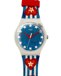 Swatch watch with red, white, and blue strap on a white background
