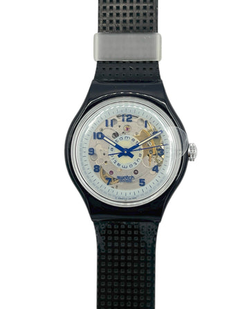 Swatch watch with black strap and white face on a white background
