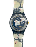 Swatch watch featuring a sheep and stars pattern on a navy blue dial with gold accents, set against a plain white background.