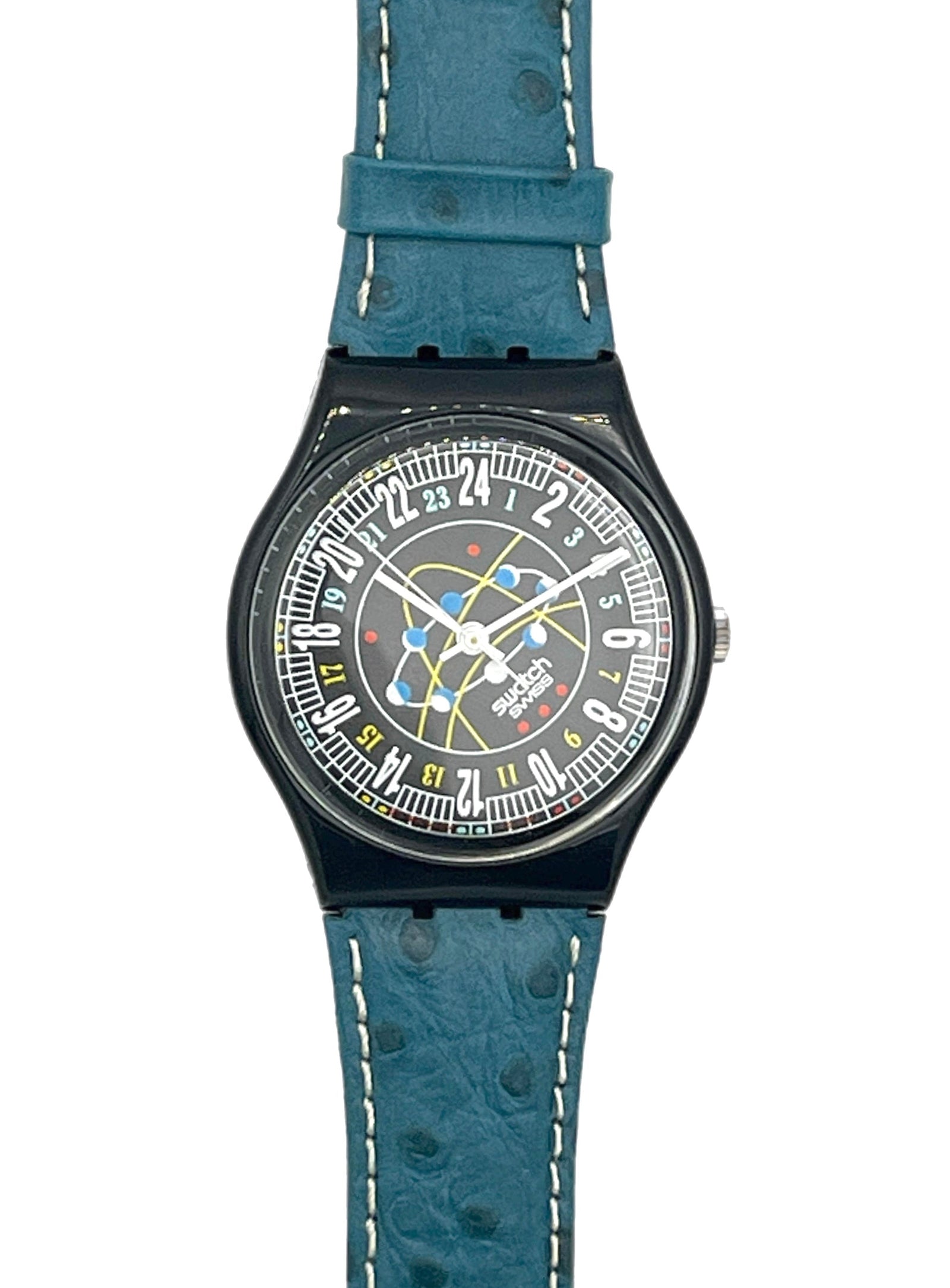 A wristwatch with a textured blue strap, a black case, and a detailed multicolor space-themed dial featuring a rocket and the words 'SPACE ZOOM'.
