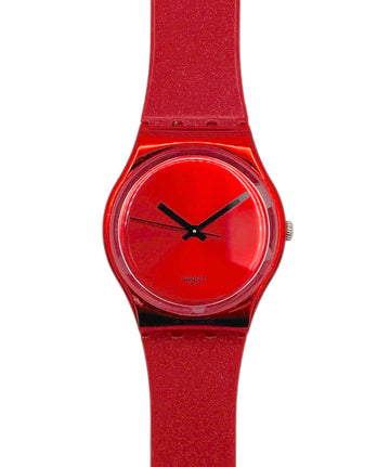Red watch with a matching strap on a white background