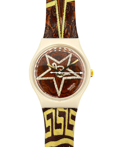 Watch with a star design on the face and patterned strap on a white background