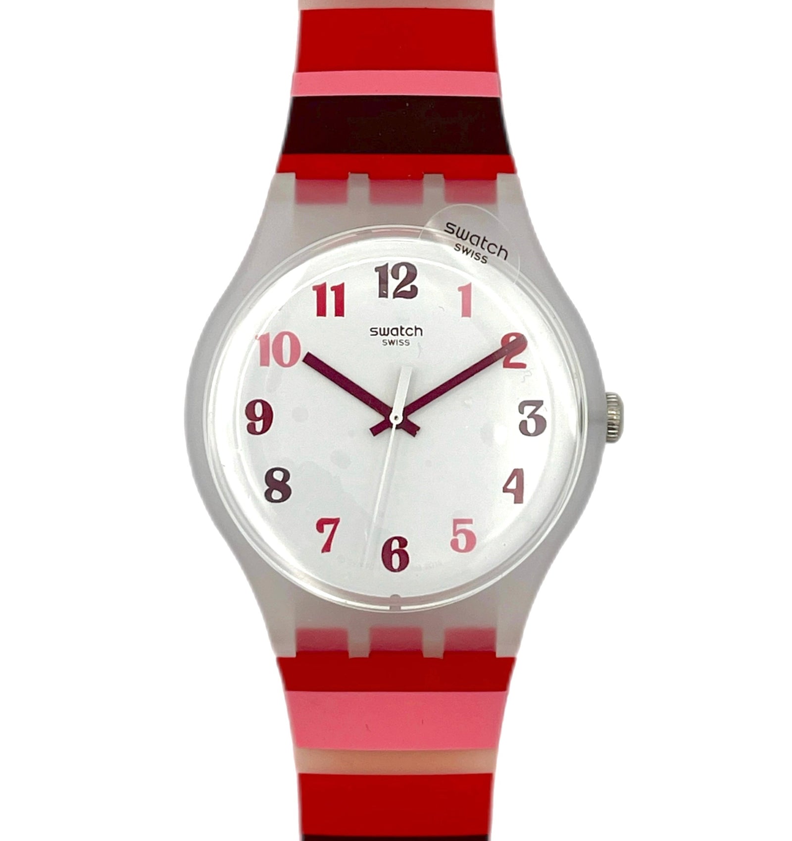 Swatch watch with a red and pink striped strap on a white background